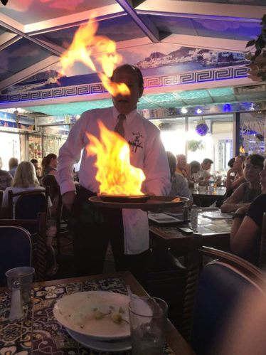 Flaming cheese, Saganaki, is a Greek dish you must try! Delicious...Opa!